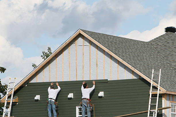 Professional Siding Installation technician working in Newark, NY